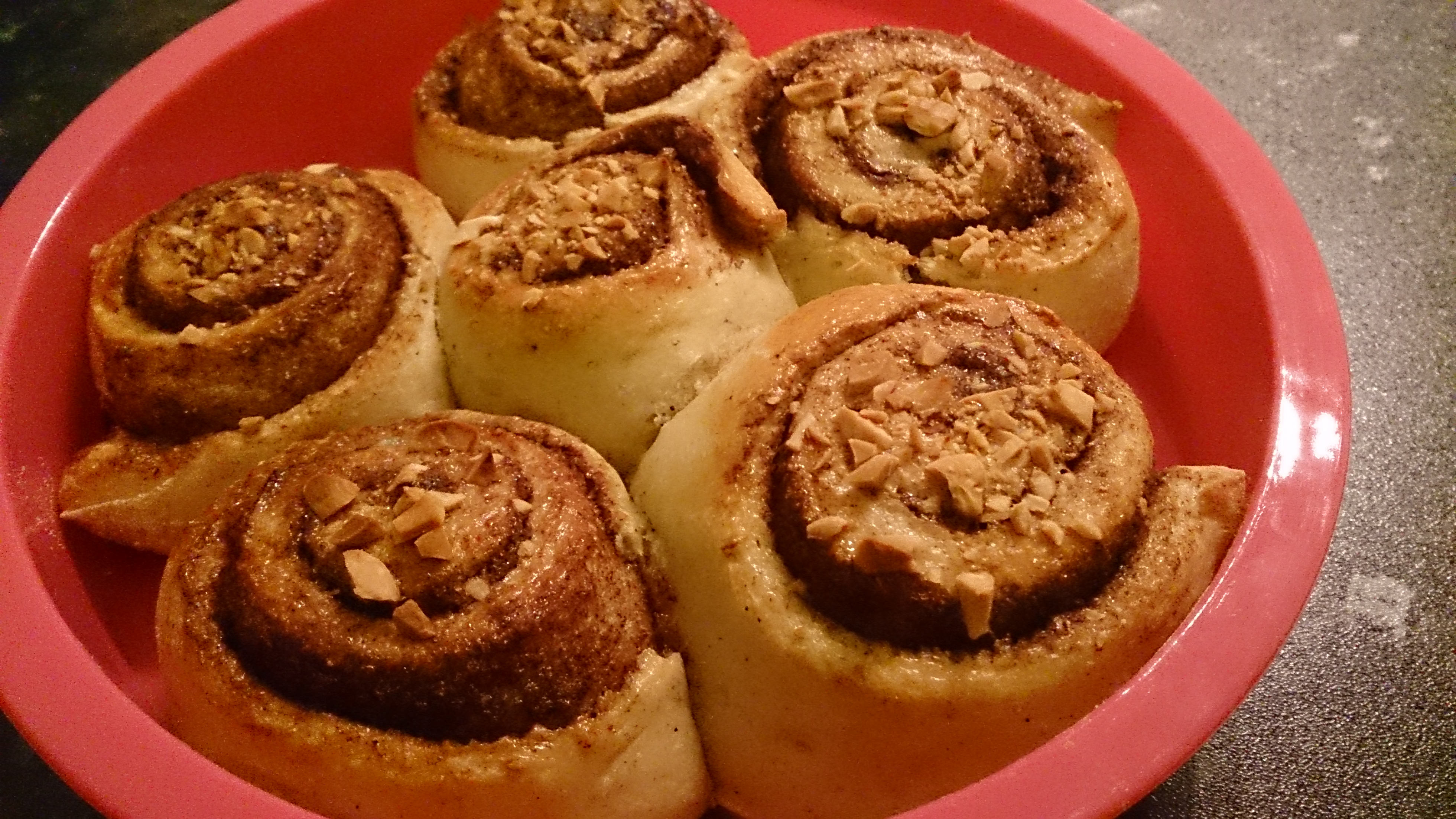 Kanelbullar – Swedish Cinnamon Buns in a round pink silicone baking pan