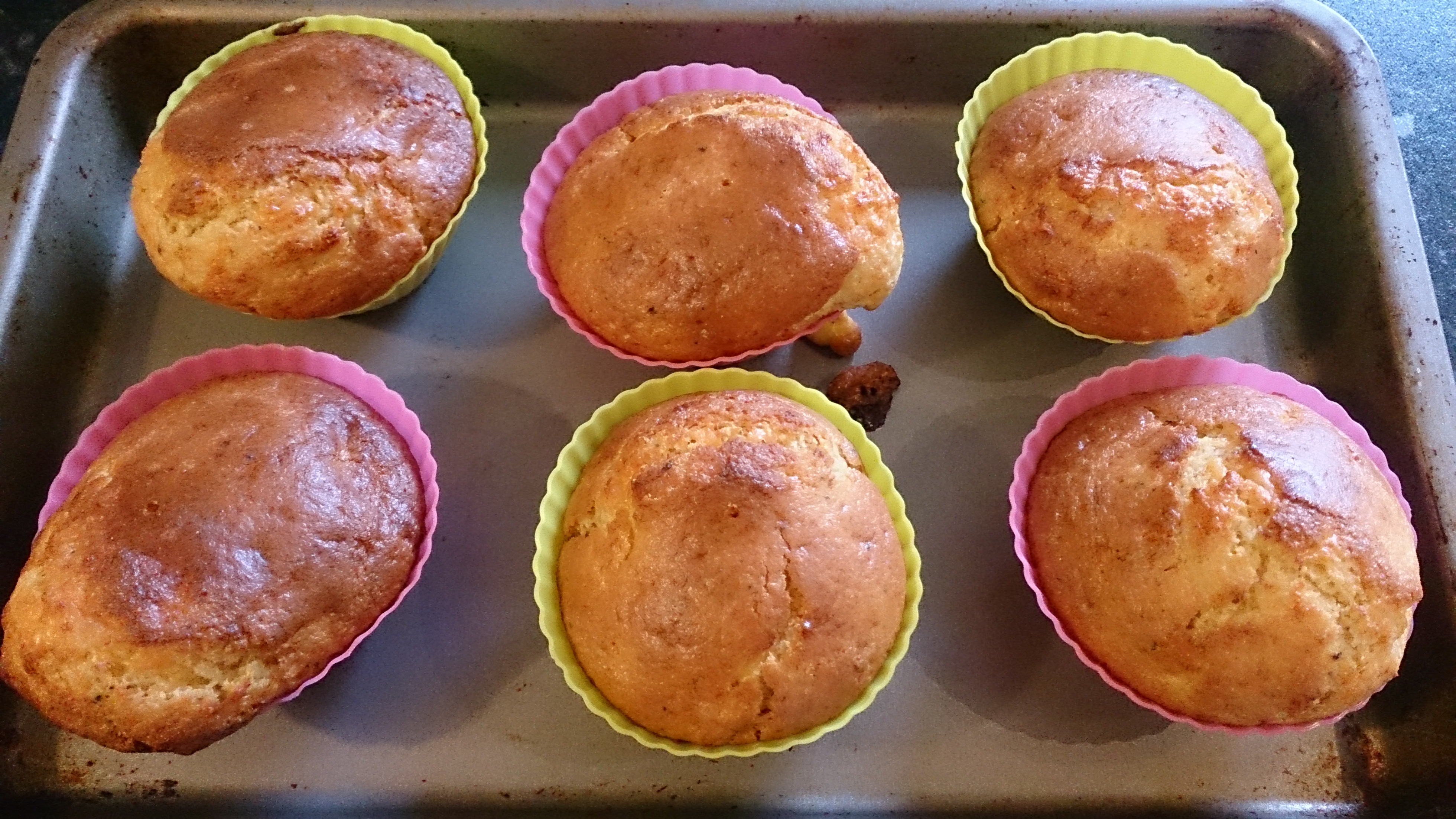 Baked cornbread muffins in individual silcone muffin cups