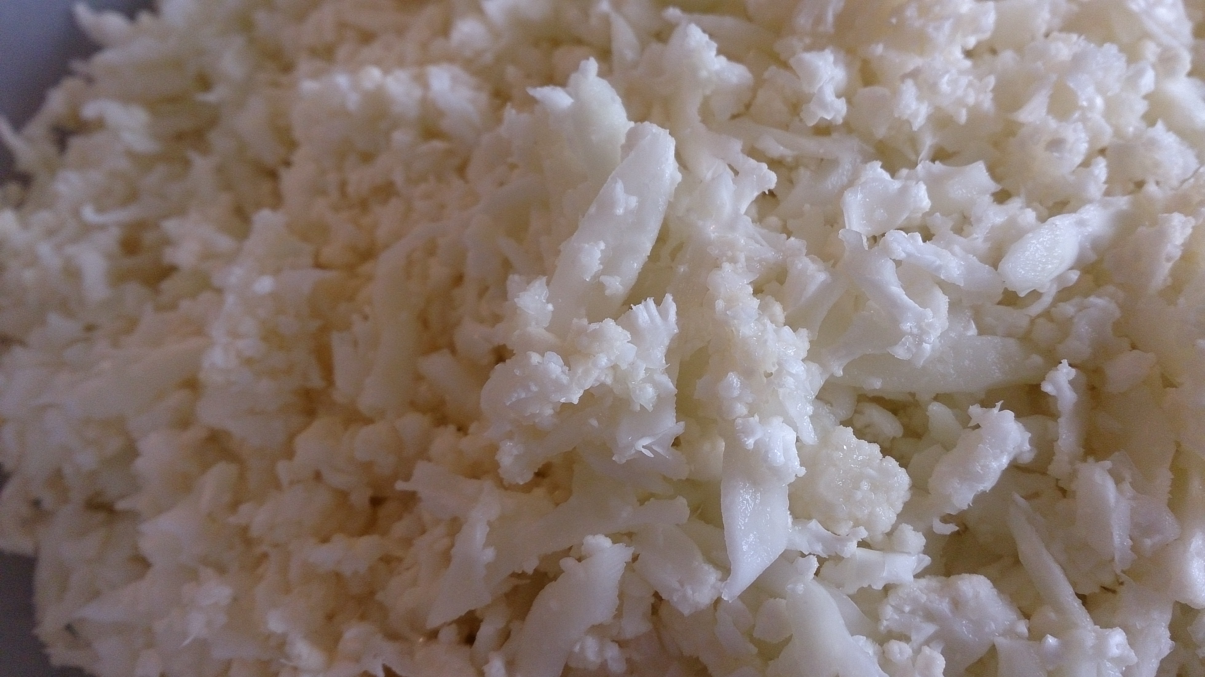 Closeup of Cauliflower Rice in a large white bowl