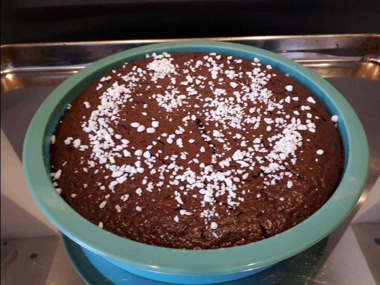 Sourdough Chocolate Brownies in a blue round silicone baking tin